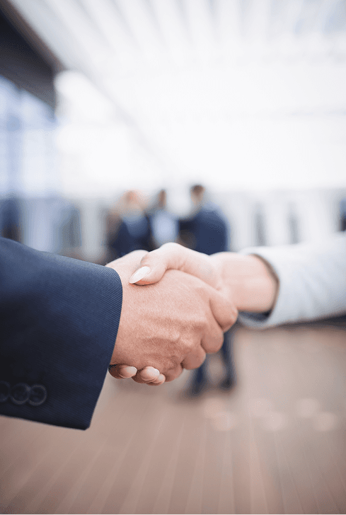 Business partnership handshake